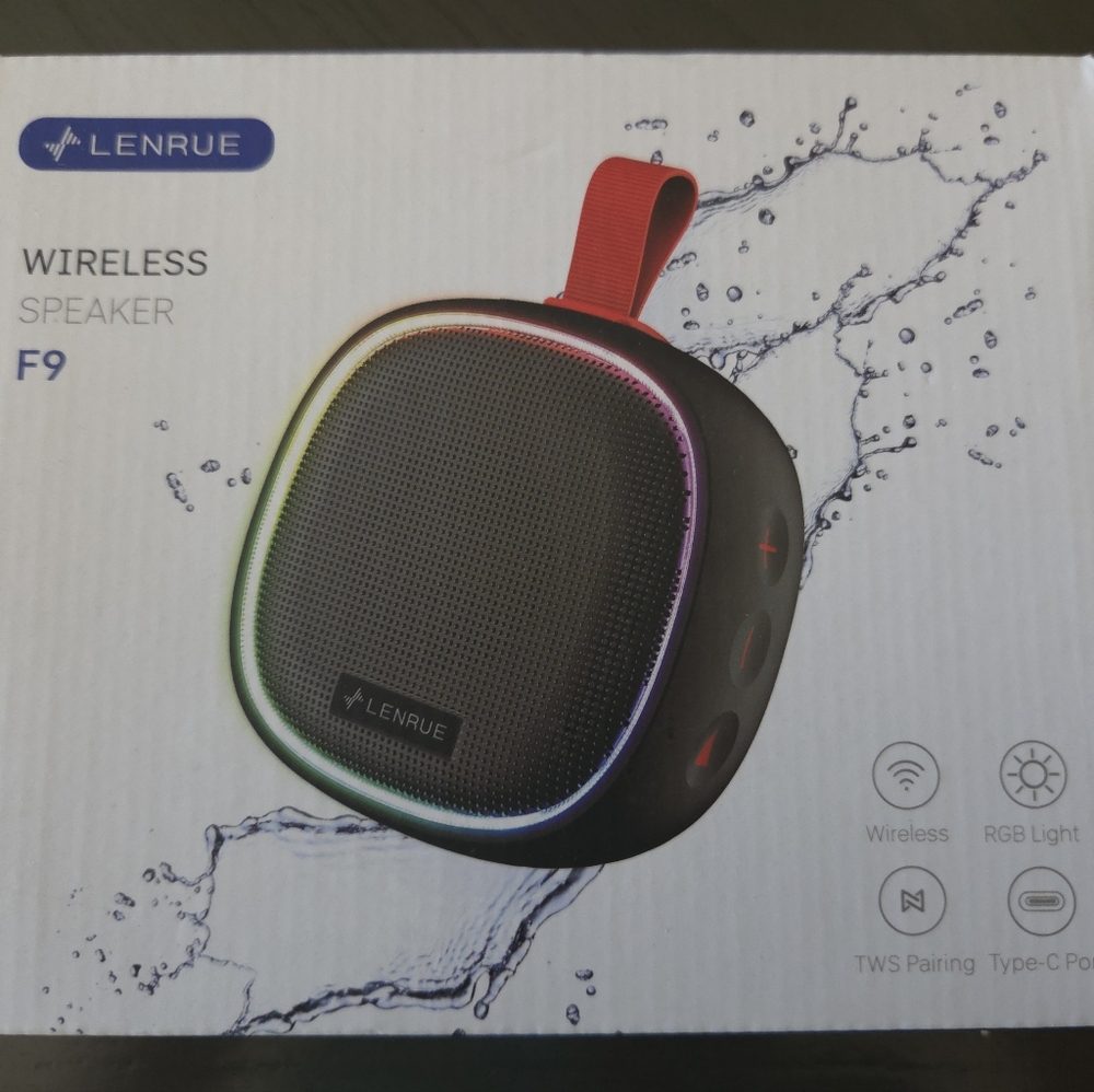 Black Wireless Speaker with RGB Light. Has never been used, in original box.